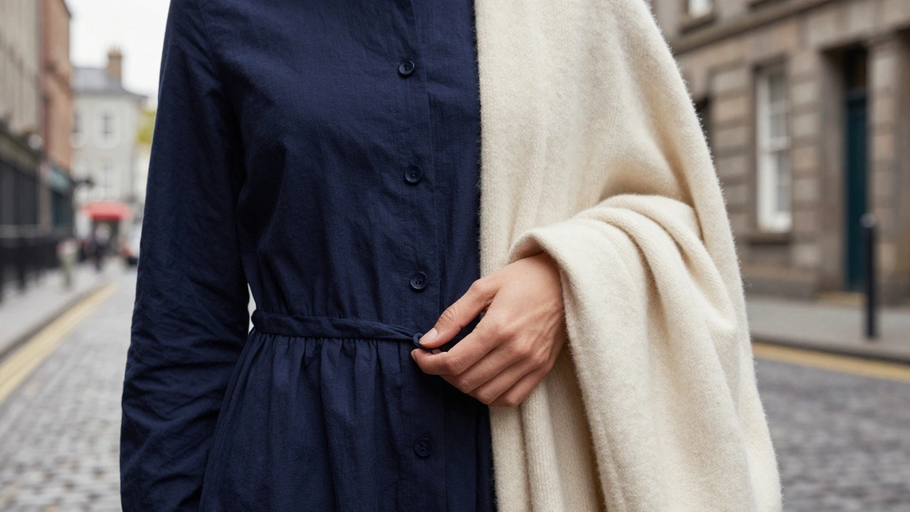 Close-up of cotton dress and wool cardigan layers