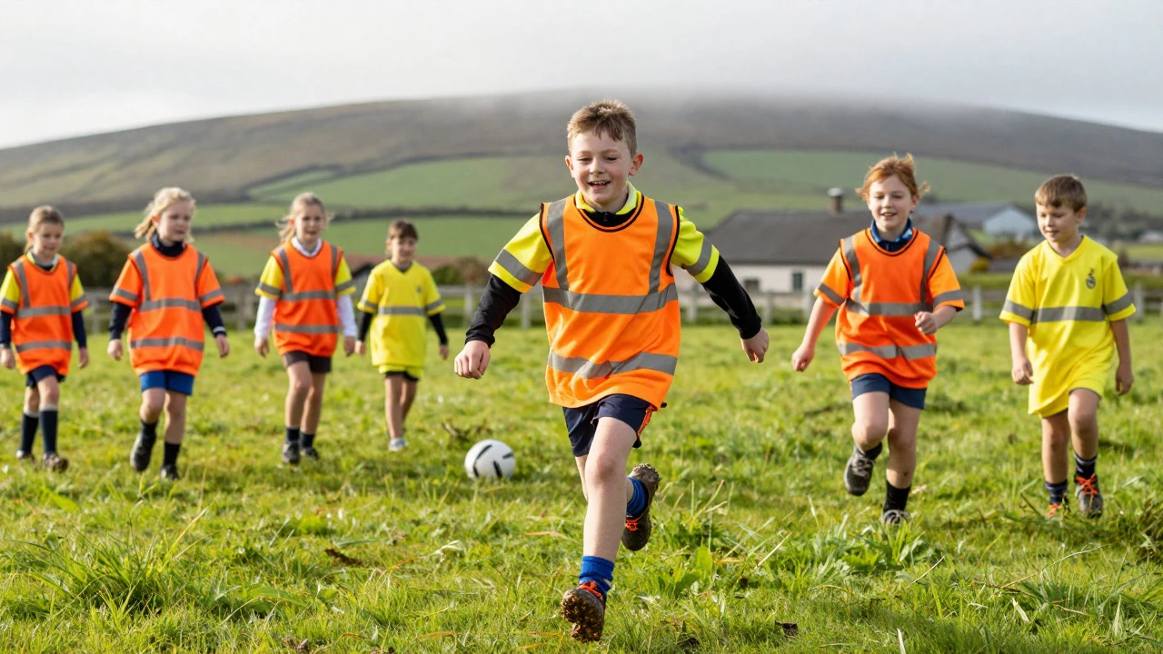 Children in bright orange PE kits playing sports on a green Irish field.