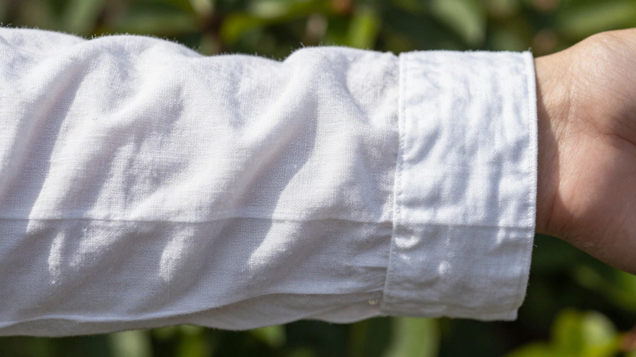 Close-up of wet linen fabric showing water droplets and fiber texture